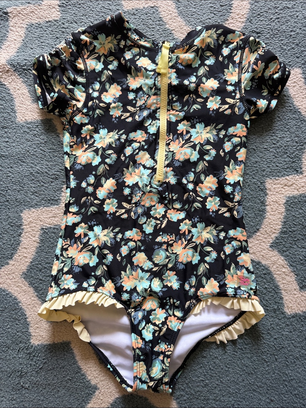 Ruffle Butts Black Floral One-Piece Swimsuit with Yellow Ruffle Trim